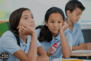 A picture of students who appear to be bored in class.